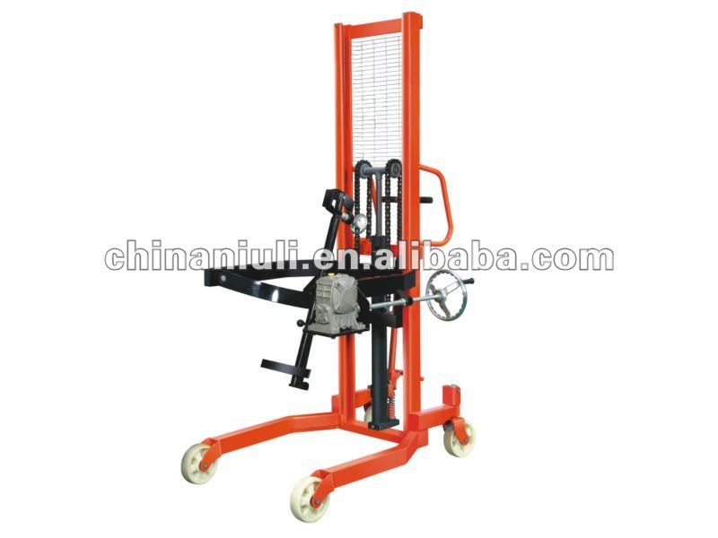 Tilting barrel fork lift