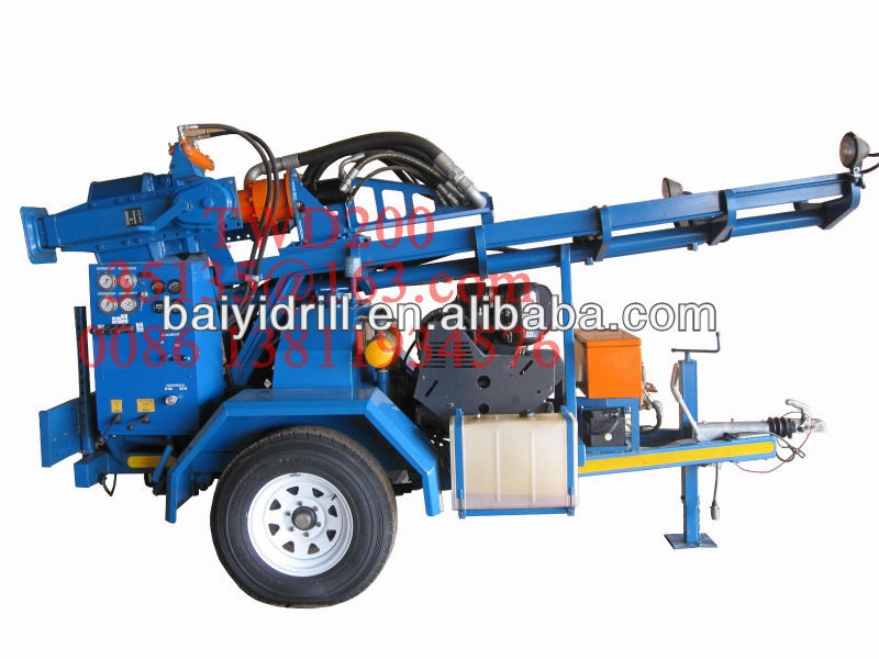 Trailer mounted water well drilling rig