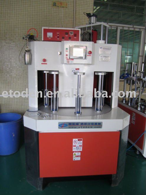 tube bottom gluing machine