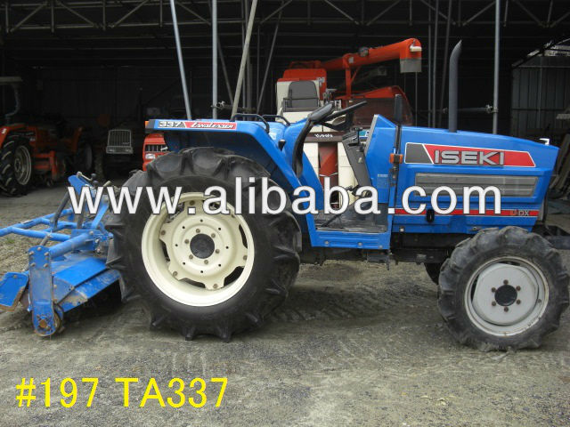 USED TRACTOR WITH ROTARY TILLERS