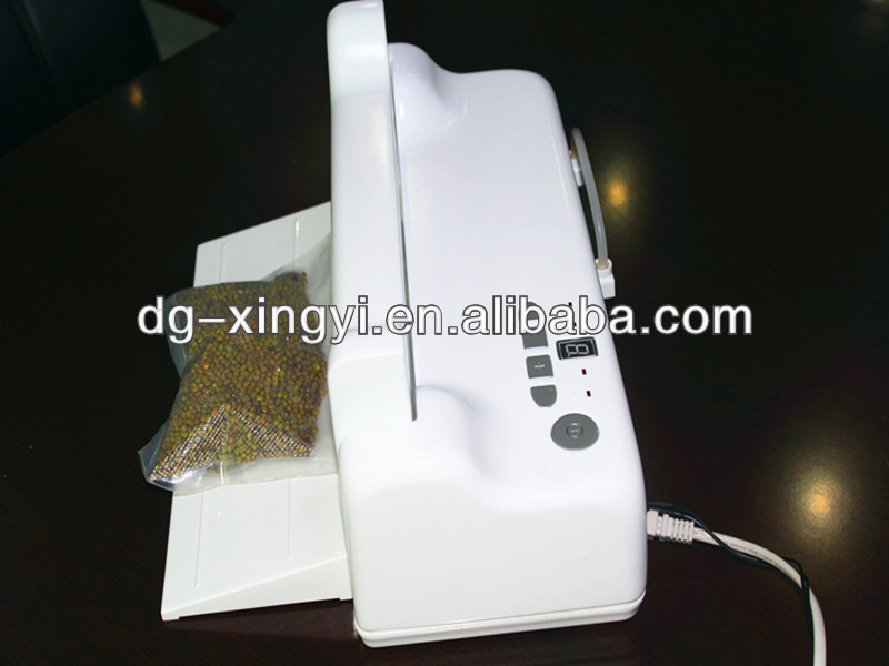 vacuum sealer packing machine, household vacuum packer, automatic vacuum food saver