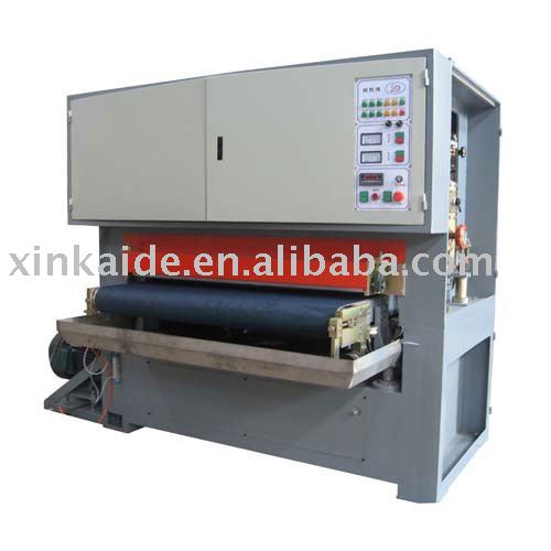 wide abrasive belt grinding machine on Metal surface wet