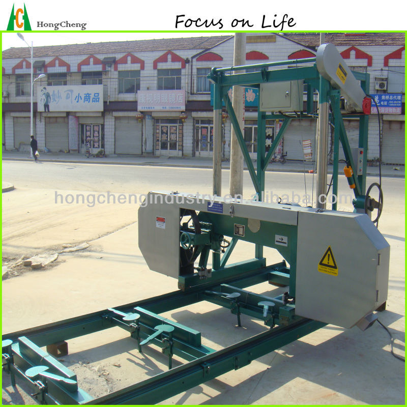 wood band saw machine/sawmill (in virgin forest area)