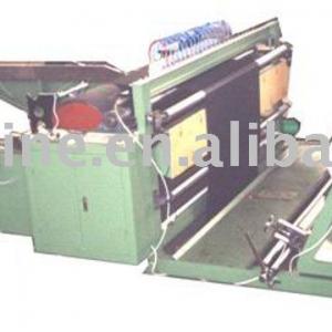 Air knife cloth rewinding slitter