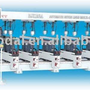 Auto feeding multiple spinde drilling machine