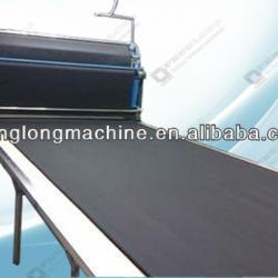 AUTOMATIC CLOTH PAVING MACHINE