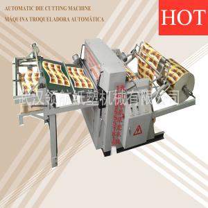 Automatic shoe sole die cutting machine cutting roll into soles