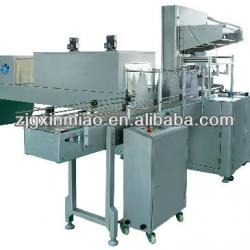 Automatic shrink packaging machine