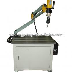 Automatic tapping machine