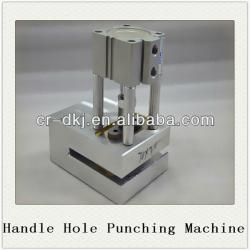 Bag handle puncher