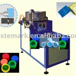 Bottle cap/cover slotting machine