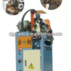 Chamfering machine for metal round pipes or bars