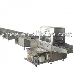 Chocolate enrobing machine