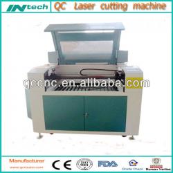 co2 laser paper cutting machine/cheap laser engraving & cutting machine with water pump co2 laser tube air pump water chiiler