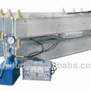 Conveyor belt splicing machine