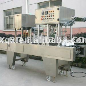 Cylinder-packaged wet tissue wetting and cover conglutinating machine