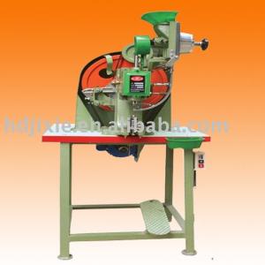 Double head eyelet machine