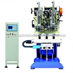 Double head high speed flat wire tufting machine