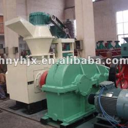 Efficiency wood briquette press