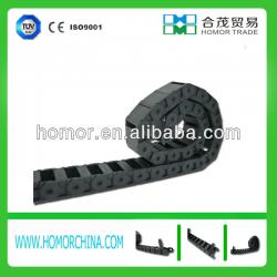 Electric plastic tow chain conveyor