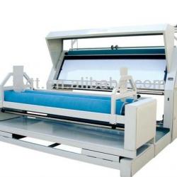 Fabric checking and packing machine