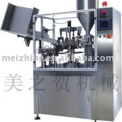 Filling and sealing machine