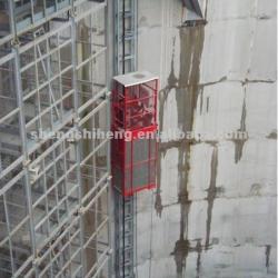 Frequency conversion hoist with single cage construction material hoist