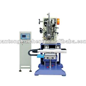 High speed flat wire tufting machine