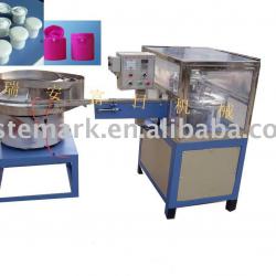 Hinge cap assembly machine