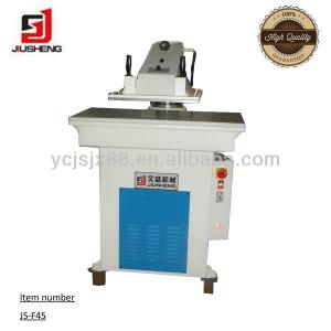 Hydraulic swing arm cutting machine for shoes