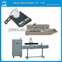 Induction sealing machine