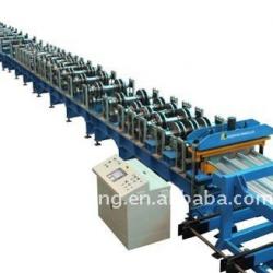 Metal floor deck forming machine