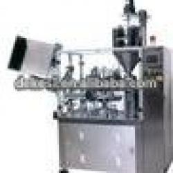 Metal tube filling machine with closures tail