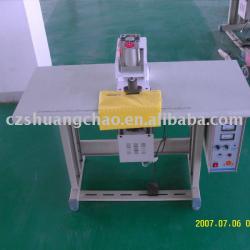 Non-woven fabric bag handle punching machine