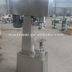 Nut can seaming machine