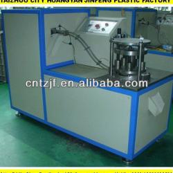 Plastic cap folding machine