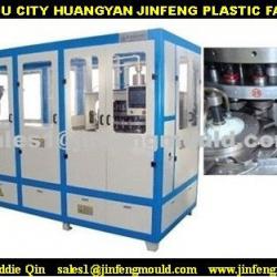 Plastic closure making machine