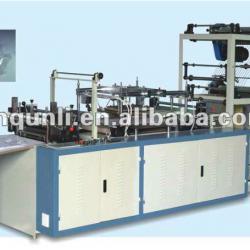 Plastic glove making machine