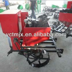 Potato planting machine with fertilizer spreader