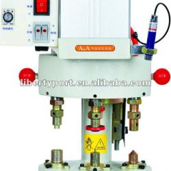 Safety Button attaching machine