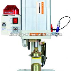 Safety Button attaching machine