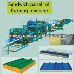 Sandwich panel machine