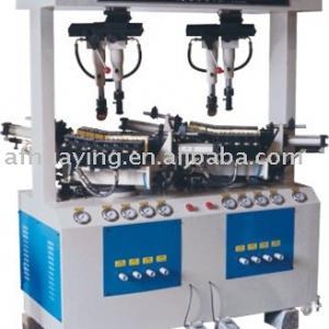 Self-Positioning Universal Sole Attaching Shoe Making Machine