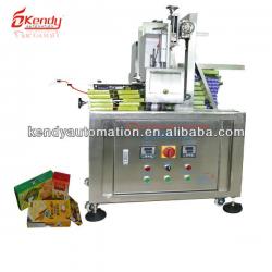 Semi-automatic folding box gluing machine