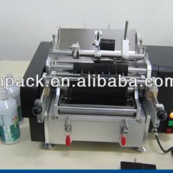 Semi-automatic glue labeling machine