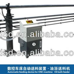 Semi-automatic oil bar feeder for CNC lathe