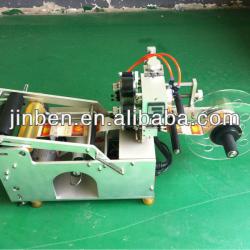 Semi-automatic self-adhesive labeling machine for beer bottles