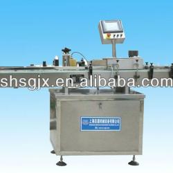 SGLT-Vertical sticker labeling machine.Round bottle labeling machine