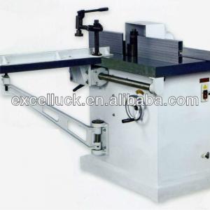 Sliding table wood shaper