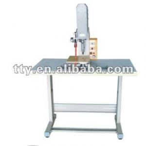 SNAP FASTENING MACHINE